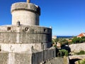 An interesting closeup of the TvrÃâava MinÃÂeta or Minceta Tower with the adriatic sea in the background.